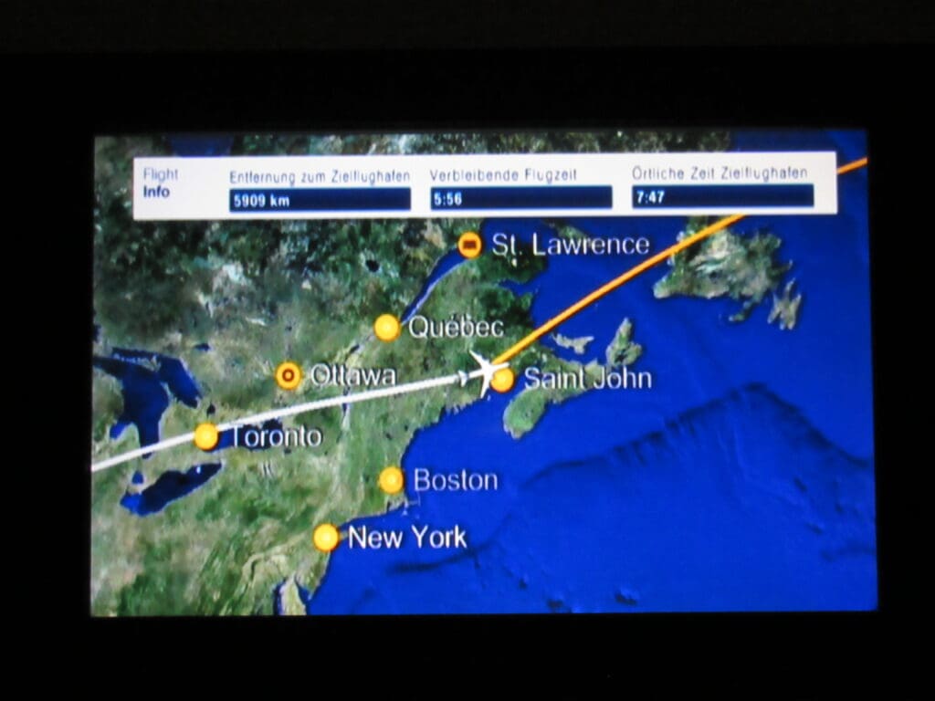 a map of the world with a plane route