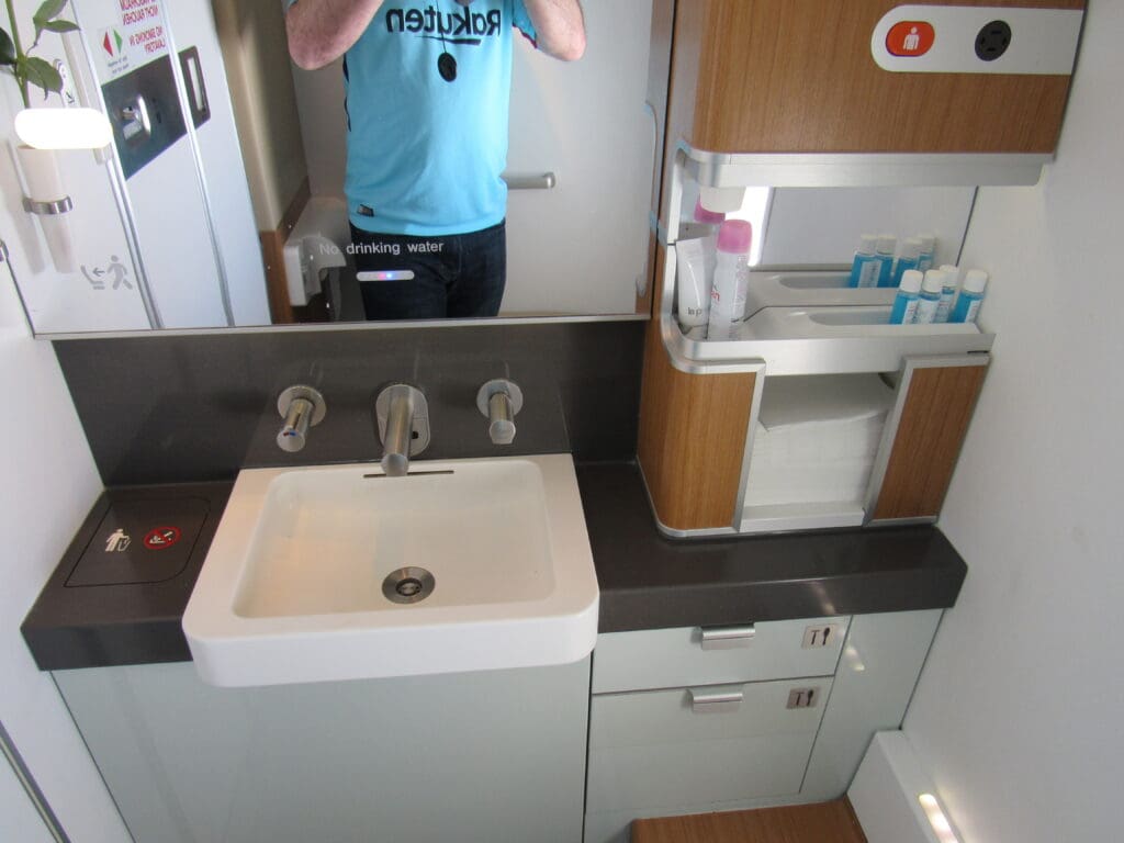 a person standing in front of a mirror