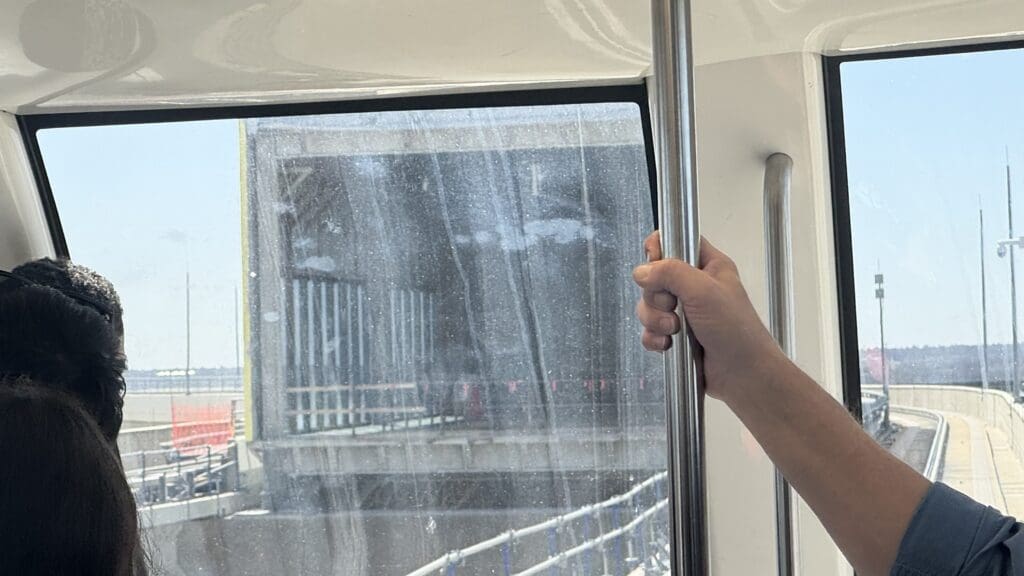 a hand holding a pole