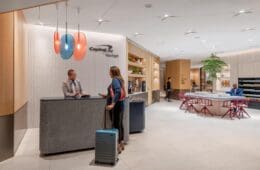 a man and woman at a reception desk