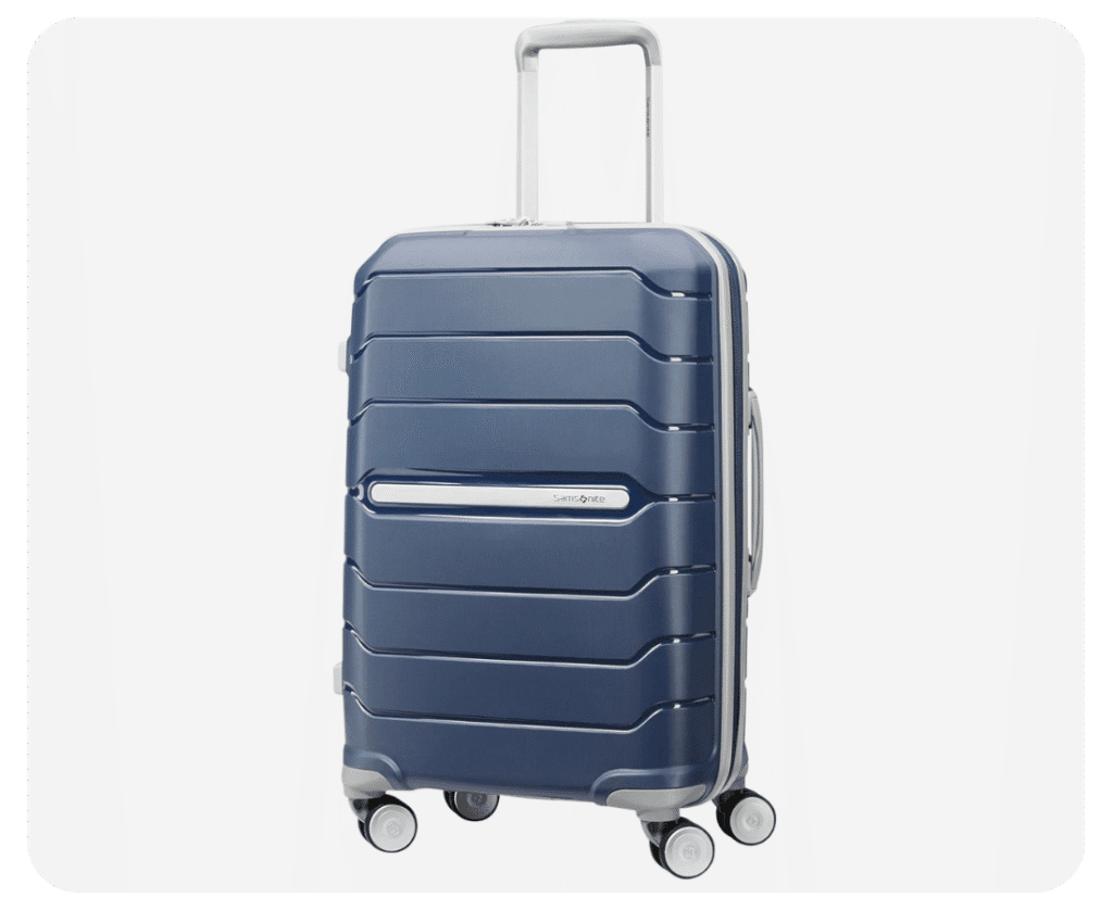 A navy Samsonite Freeform Carry-On bag on a neutral background