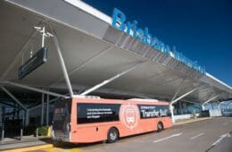 a bus parked in front of a building