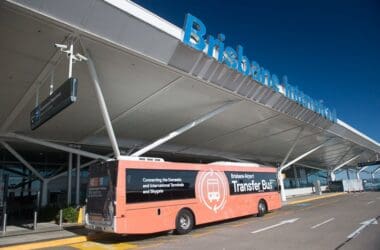 a bus parked in front of a building