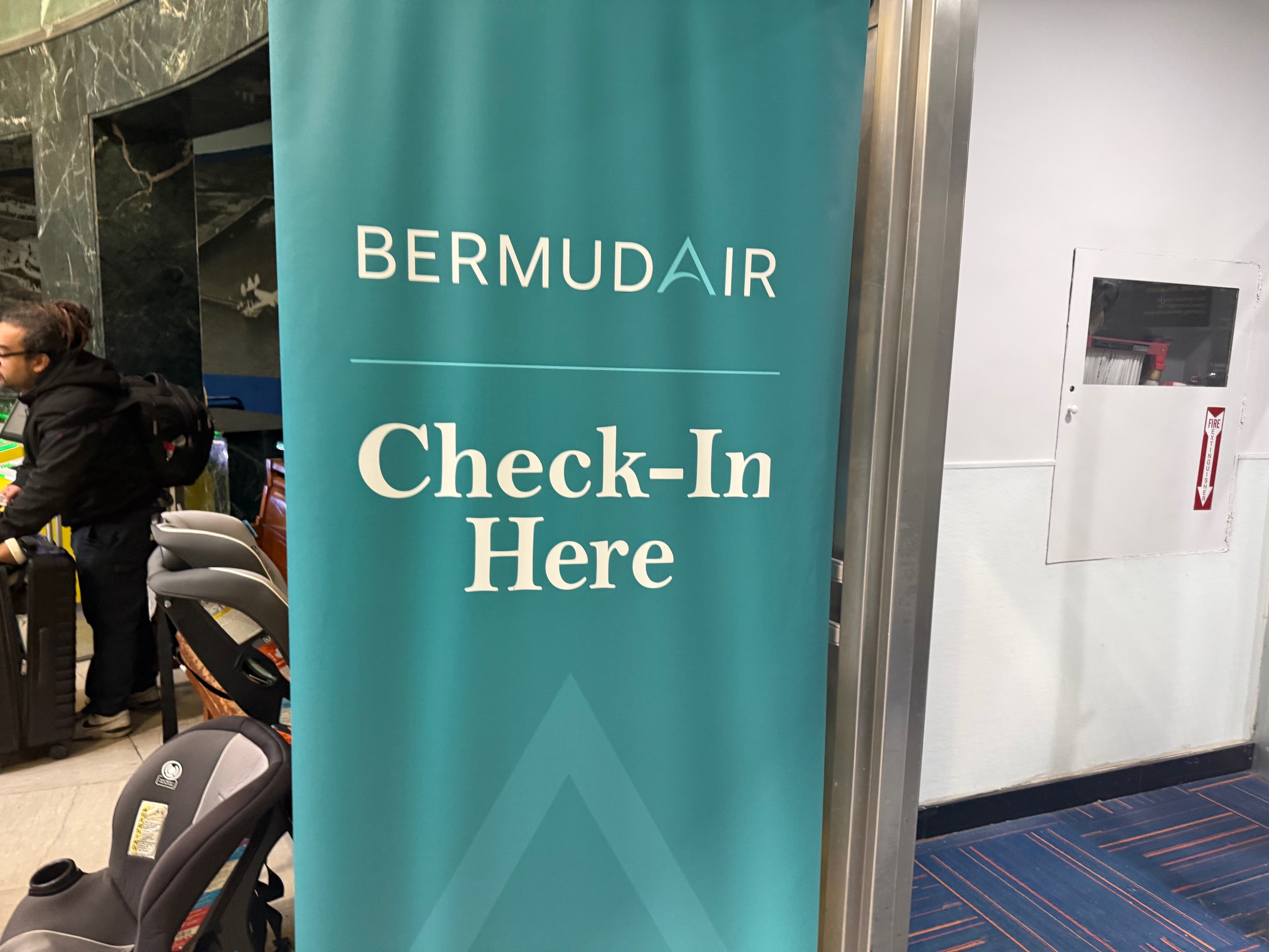 a blue sign with white text