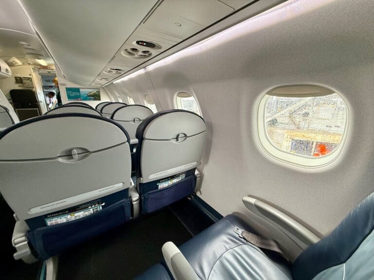 the seats in a BermudAir E175 Economy Cabin