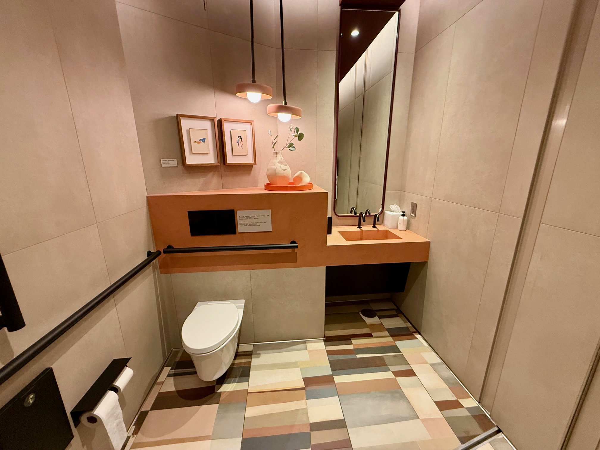 a bathroom with a sink and mirror