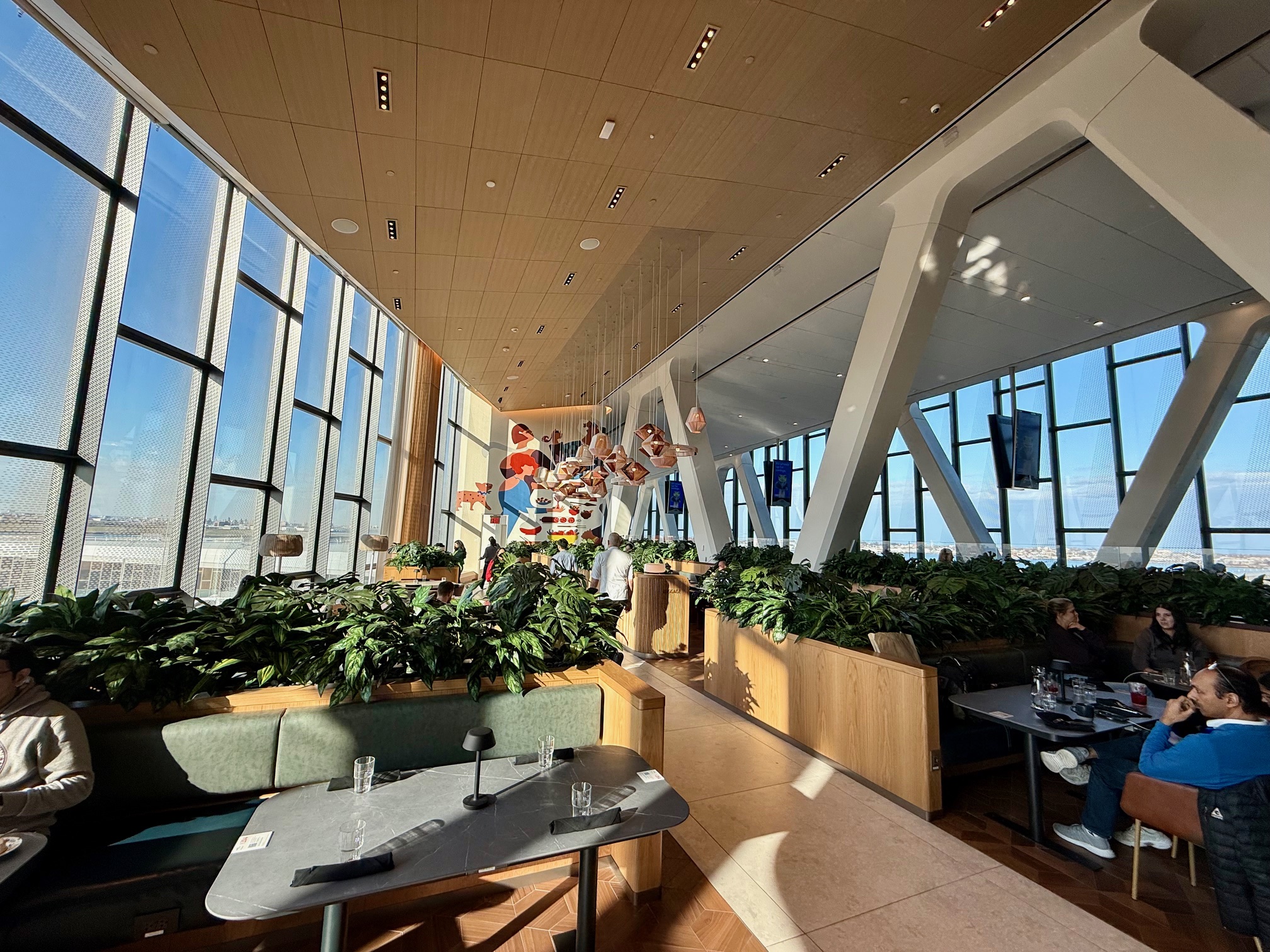 a group of people in the Capital One Landing at LaGuardia
