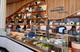 a display case with food on it at the Capital One Landing at LaGuardia