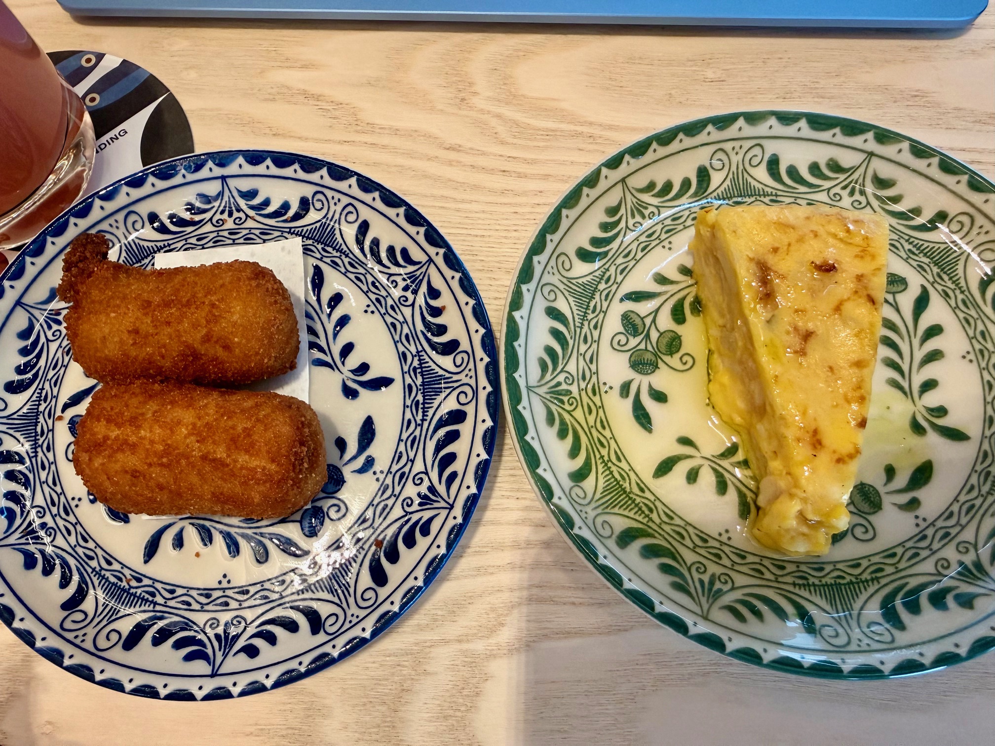 a plate of food on a table at the Capital One Landing at LaGuardia