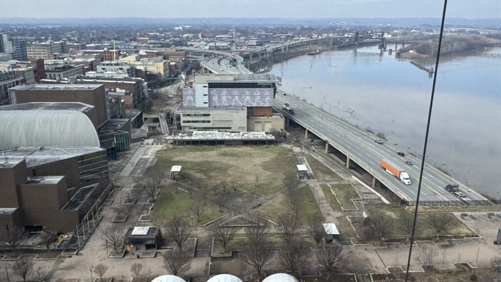 a city with a bridge and a body of water