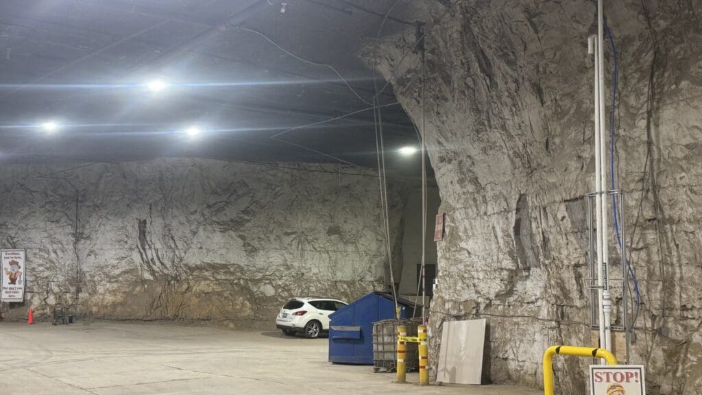 a car parked in a large cave