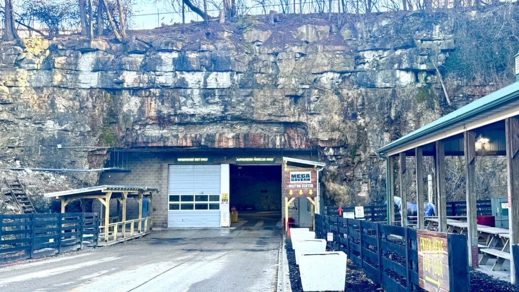 a building with a gate and a fence