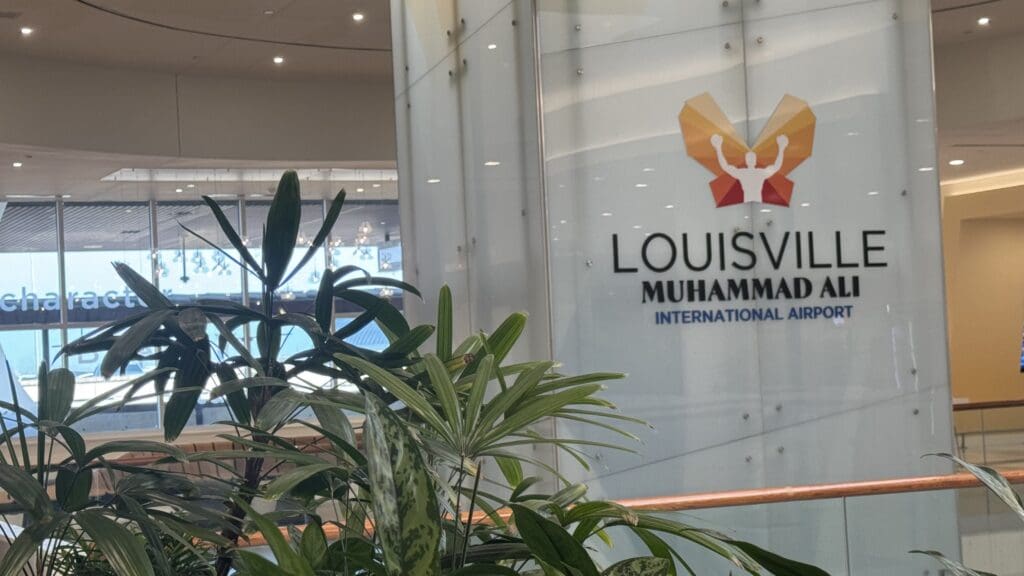 a plant in front of a building