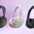 Three pairs of travel headphones featuring noise cancellation on a gradient background